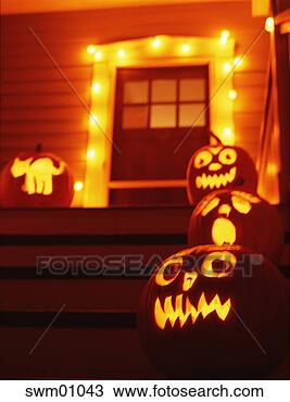 Stock Photo - jack-o-lanterns 
on doorsteps. 
fotosearch - search 
stock photos, 
pictures, images, 
and photo clipart