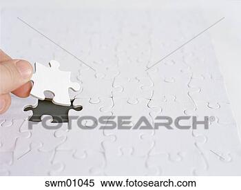 Stock Image - last piece of 
blank puzzle. 
fotosearch - search 
stock photos, 
pictures, images, 
and photo clipart