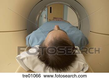 Stock Photo - male patient in 
scanner. fotosearch 
- search stock 
photos, pictures, 
images, and photo 
clipart