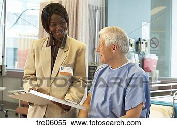 Stock Image - male patient talking 
with healthcare 
worker. fotosearch 
- search stock 
photos, pictures, 
images, and photo 
clipart