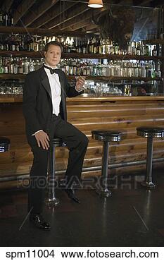 Stock Photo - man at bar. fotosearch 
- search stock 
photos, pictures, 
images, and photo 
clipart