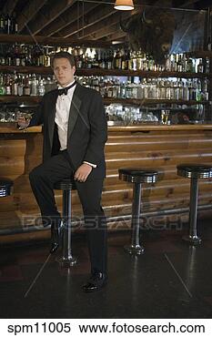 Stock Image - man at bar. fotosearch 
- search stock 
photos, pictures, 
images, and photo 
clipart
