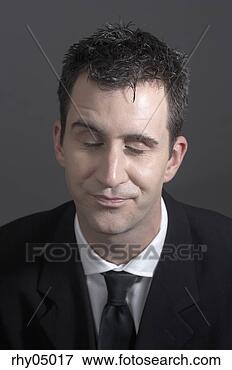 Picture - man with cynical 
look on his face. 
fotosearch - search 
stock photos, 
pictures, images, 
and photo clipart