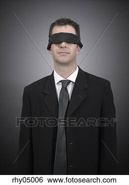 Stock Photo - man wearing a 
blindfold. fotosearch 
- search stock 
photos, pictures, 
images, and photo 
clipart