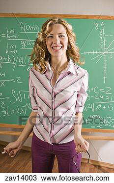 Stock Photo - math teacher by 
blackboard. fotosearch 
- search stock 
photos, pictures, 
images, and photo 
clipart