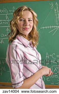 Stock Photo - math teacher by 
blackboard. fotosearch 
- search stock 
photos, pictures, 
images, and photo 
clipart