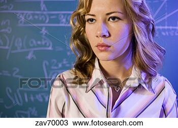 Stock Photo - math teacher and 
equation on the 
blackboard. fotosearch 
- search stock 
photos, pictures, 
images, and photo 
clipart