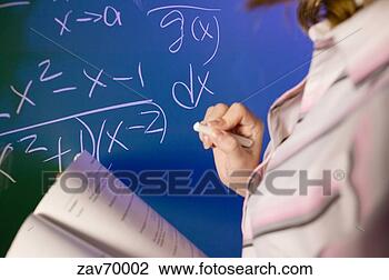 Stock Photo - math teacher writing 
equation on the 
blackboard. fotosearch 
- search stock 
photos, pictures, 
images, and photo 
clipart