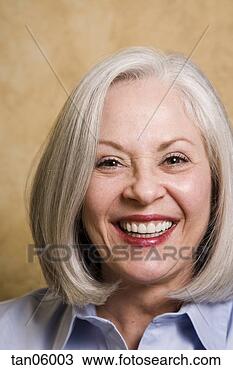 Stock Photo - mature woman smiling. 
fotosearch - search 
stock photos, 
pictures, images, 
and photo clipart