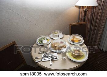 Stock Image - meals with covers 
on table. fotosearch 
- search stock 
photos, pictures, 
images, and photo 
clipart