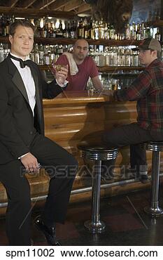 Stock Photo - men at bar. fotosearch 
- search stock 
photos, pictures, 
images, and photo 
clipart