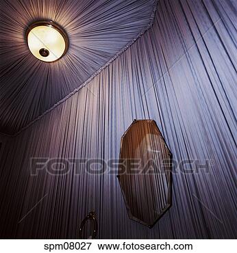 Picture - mirror and ceiling 
light on striped 
decor. fotosearch 
- search stock 
photos, pictures, 
images, and photo 
clipart