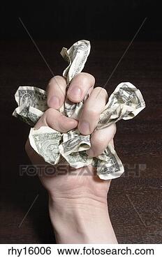 Stock Photo - money crumpled 
in fist. fotosearch 
- search stock 
photos, pictures, 
images, and photo 
clipart