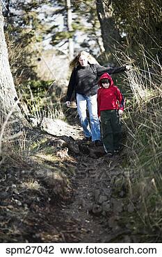 Stock Photo - mother and son 
hiking. fotosearch 
- search stock 
photos, pictures, 
images, and photo 
clipart
