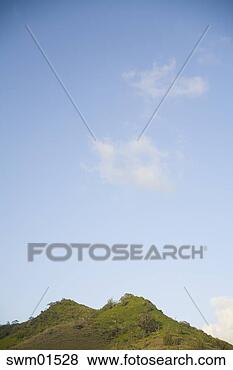 Stock Photo - mountain range 
against blue sky. 
fotosearch - search 
stock photos, 
pictures, images, 
and photo clipart