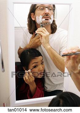 Stock Photo - multi-ethnic couple 
grooming. fotosearch 
- search stock 
photos, pictures, 
images, and photo 
clipart