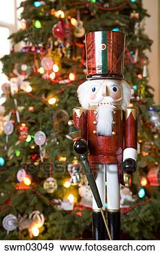 Stock Photograph - nutcracker beside 
christmas tree. 
fotosearch - search 
stock photos, 
pictures, images, 
and photo clipart