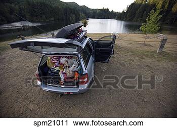 Stock Photography - open car full 
of camping equipment. 
fotosearch - search 
stock photos, 
pictures, images, 
and photo clipart