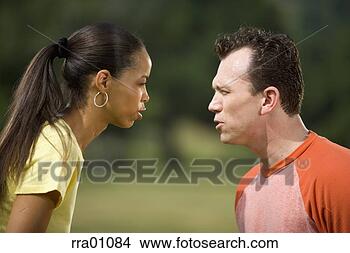 Stock Photo - opponents glaring 
at each other. 
fotosearch - search 
stock photos, 
pictures, images, 
and photo clipart