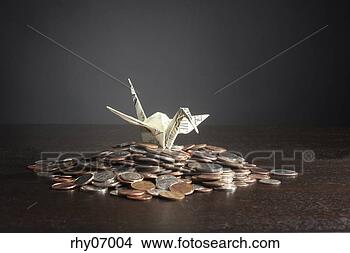 Stock Photo - origami bird with 
stack of coins. 
fotosearch - search 
stock photos, 
pictures, images, 
and photo clipart