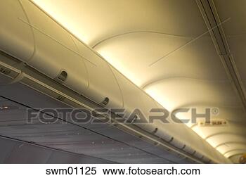 Stock Image - overhead compartments 
on airplane. fotosearch 
- search stock 
photos, pictures, 
images, and photo 
clipart