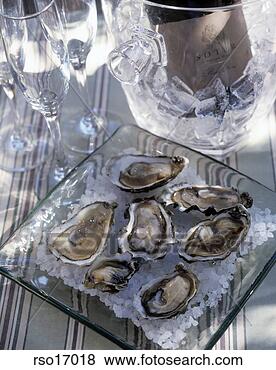 Stock Photo - oysters on half 
shell. fotosearch 
- search stock 
photos, pictures, 
images, and photo 
clipart