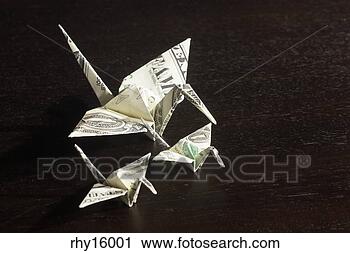 Stock Photography - paper crane made 
out of dollar 
bill. fotosearch 
- search stock 
photos, pictures, 
images, and photo 
clipart