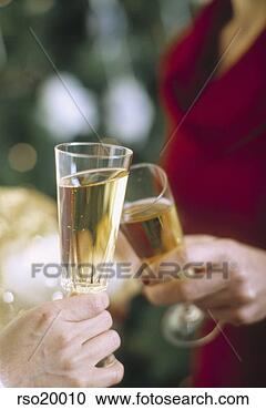 Stock Photography - people toasting 
with wine glasses. 
fotosearch - search 
stock photos, 
pictures, images, 
and photo clipart