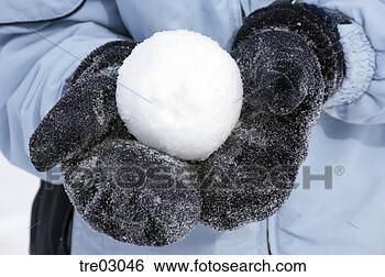 Stock Photo - person holding 
snowball. fotosearch 
- search stock 
photos, pictures, 
images, and photo 
clipart