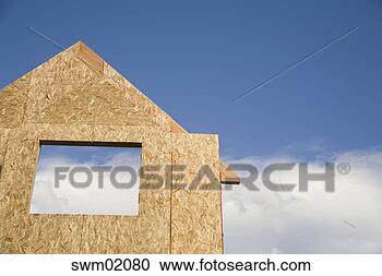 Stock Photography - plywood house 
frame against 
blue sky. fotosearch 
- search stock 
photos, pictures, 
images, and photo 
clipart