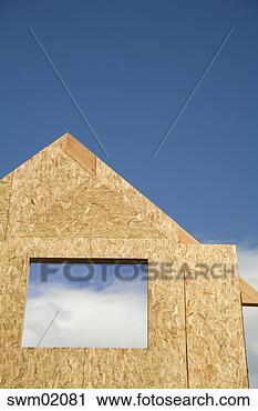 Stock Photography - plywood house 
frame against 
blue sky. fotosearch 
- search stock 
photos, pictures, 
images, and photo 
clipart