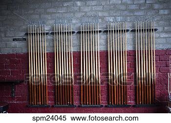 Stock Image - pool cues in rack. 
fotosearch - search 
stock photos, 
pictures, images, 
and photo clipart