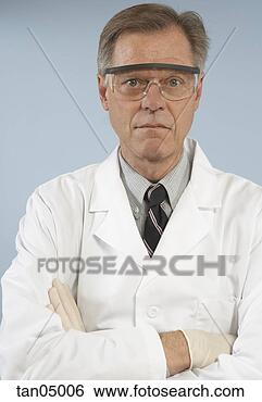 Stock Photo - portrait of scientist 
with protective 
eye wear. fotosearch 
- search stock 
photos, pictures, 
images, and photo 
clipart