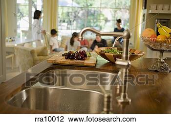 Stock Photo - prepared food 
sitting by kitchen 
sink. fotosearch 
- search stock 
photos, pictures, 
images, and photo 
clipart