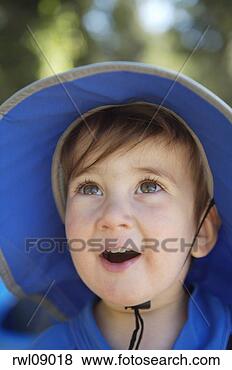 Stock Photo - preschooler looking 
up in wonder. 
fotosearch - search 
stock photos, 
pictures, images, 
and photo clipart