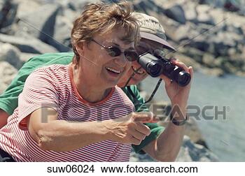 Stock Photo - senior adult couple 
sightseeing. fotosearch 
- search stock 
photos, pictures, 
images, and photo 
clipart