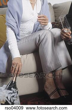 Stock Photograph - senior woman having 
wine. fotosearch 
- search stock 
photos, pictures, 
images, and photo 
clipart
