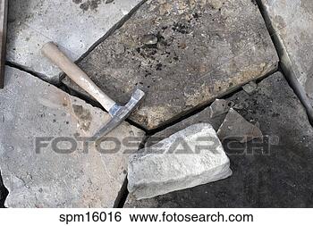 Stock Photo - sledgehammer on 
stones. fotosearch 
- search stock 
photos, pictures, 
images, and photo 
clipart
