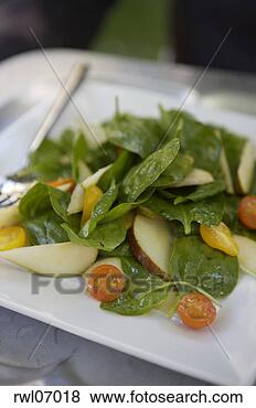 Stock Photo - spinach salad 
with pears and 
tomatoes. fotosearch 
- search stock 
photos, pictures, 
images, and photo 
clipart