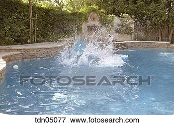 Picture - splashing in swimming 
pool. fotosearch 
- search stock 
photos, pictures, 
images, and photo 
clipart