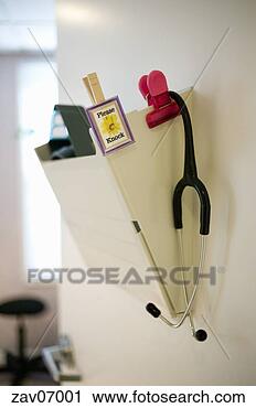 Stock Photography - stethoscope hanging 
from wall organizer. 
fotosearch - search 
stock photos, 
pictures, images, 
and photo clipart