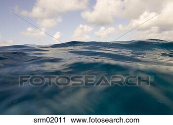 Stock Photography - surface view of 
wave. fotosearch 
- search stock 
photos, pictures, 
images, and photo 
clipart