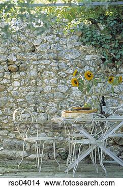 Stock Photo - table set with 
flowers outdoors. 
fotosearch - search 
stock photos, 
pictures, images, 
and photo clipart