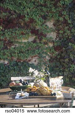Stock Image - table set with 
food outdoors. 
fotosearch - search 
stock photos, 
pictures, images, 
and photo clipart