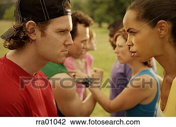 Stock Photo - teams glaring 
at each other. 
fotosearch - search 
stock photos, 
pictures, images, 
and photo clipart