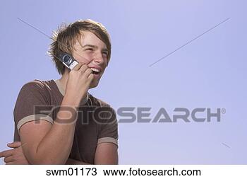 Stock Photo - teenage boy talking 
on cell phone. 
fotosearch - search 
stock photos, 
pictures, images, 
and photo clipart
