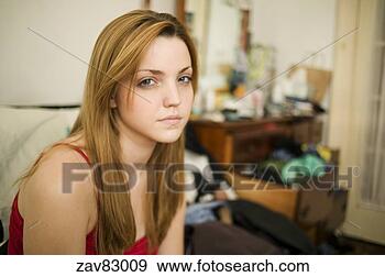Stock Photograph - teenage girl in 
bedroom. fotosearch 
- search stock 
photos, pictures, 
images, and photo 
clipart