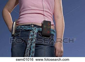 Stock Photo - teenage girl with 
cell phone and 
mp3 player. fotosearch 
- search stock 
photos, pictures, 
images, and photo 
clipart