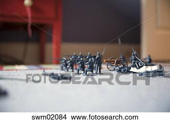 Stock Photo - toy soldiers lined 
up on floor. fotosearch 
- search stock 
photos, pictures, 
images, and photo 
clipart