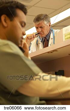 Stock Photo - two men at hospital 
reception desk. 
fotosearch - search 
stock photos, 
pictures, images, 
and photo clipart